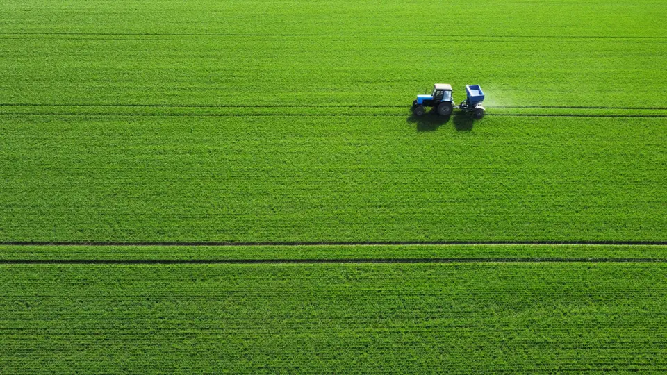 Tractor working a field